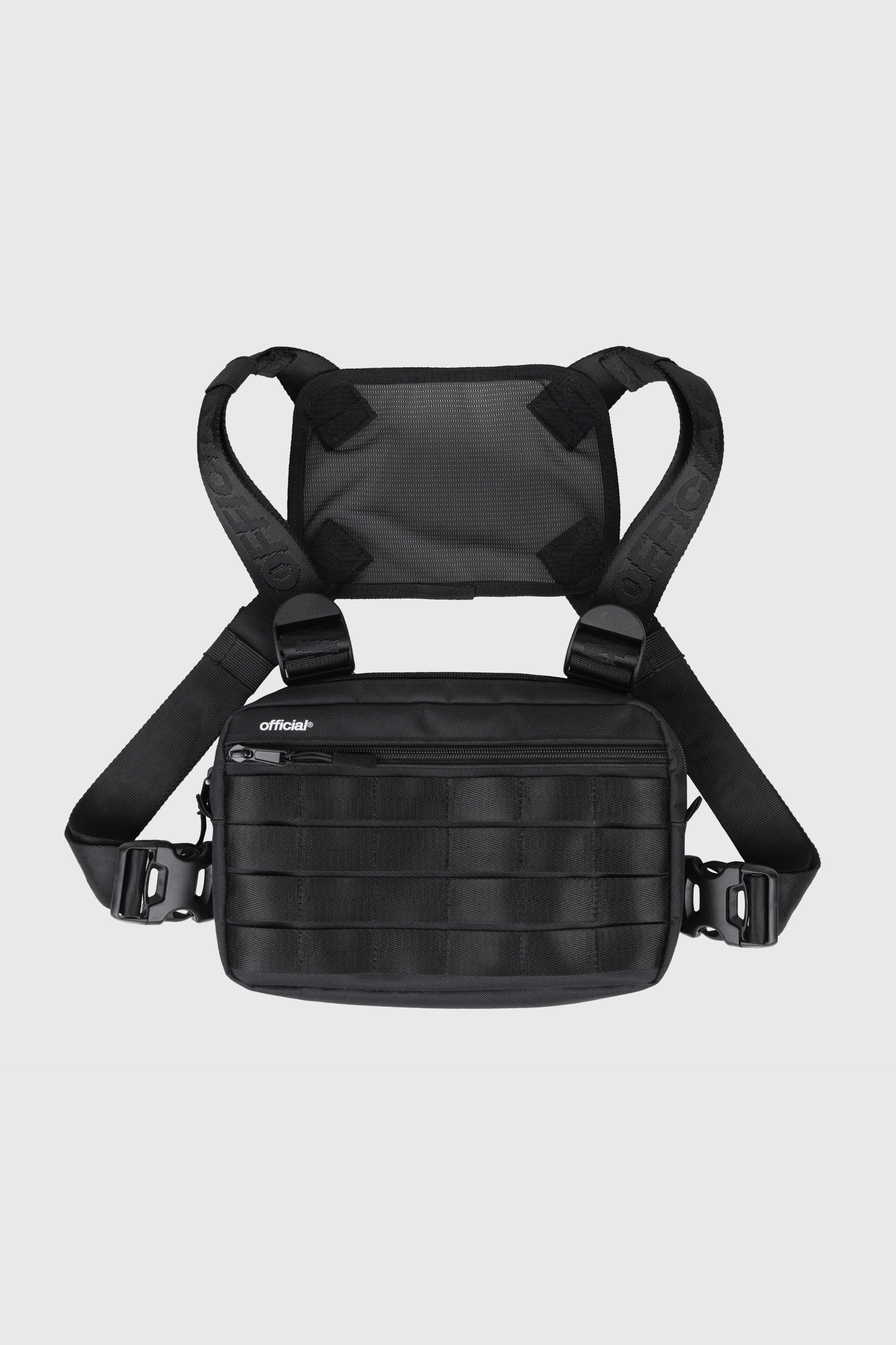 Compact Essential Chest Bag in black front view not on person. 